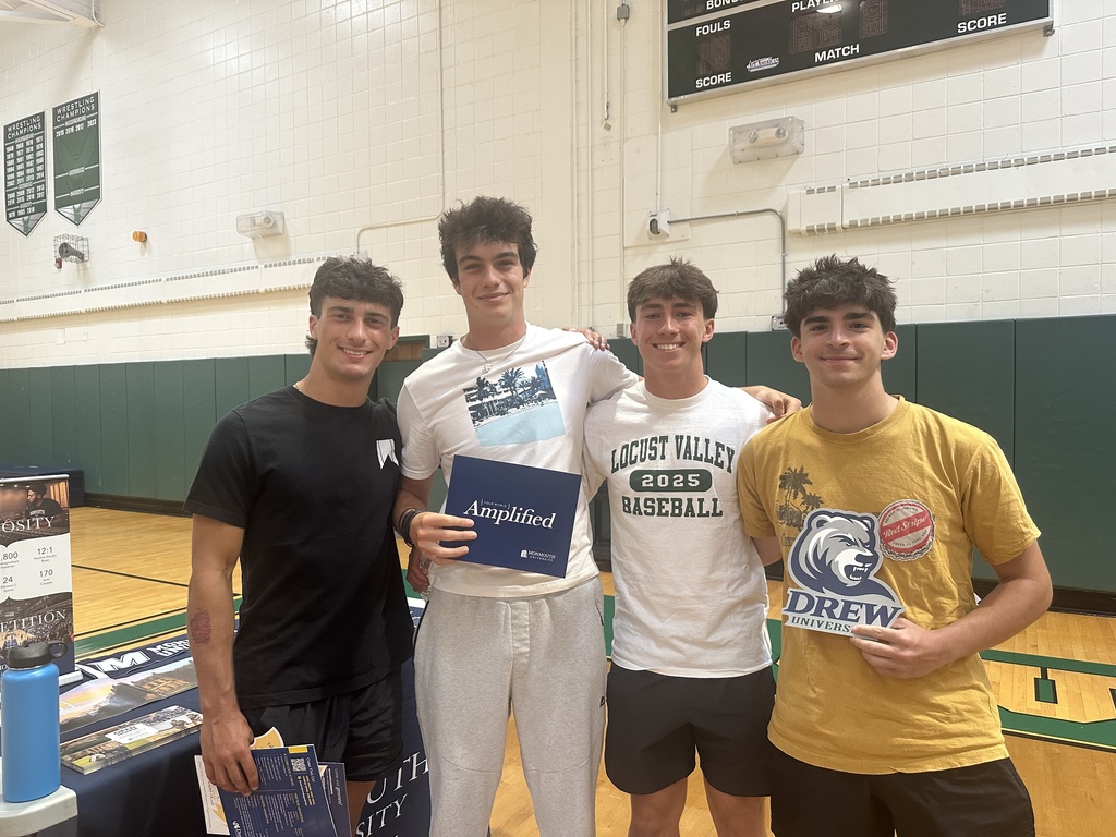 Locust Valley High School students showcase information items they picked up at the college fair.