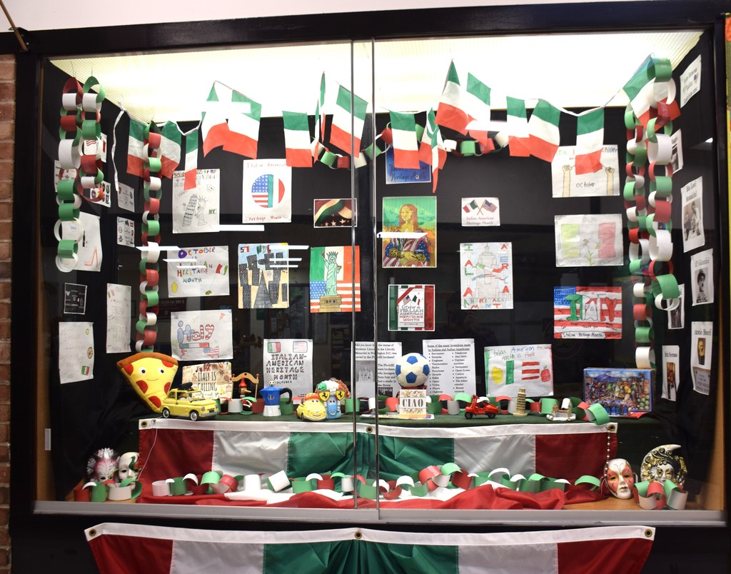 The display case in the high school for Italian American Heritage month posters.