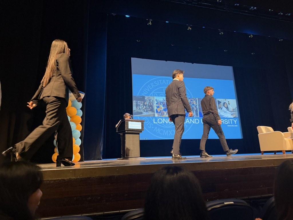 The Locust Valley High School virtual enterprise students took to the stage to present their project, NaviGlass.