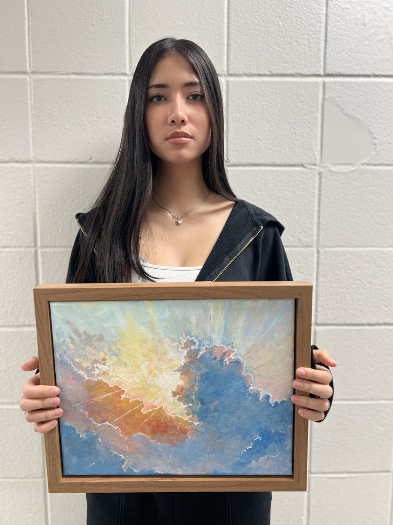Junior Chloe Arrata with her work “Untitled 1.”