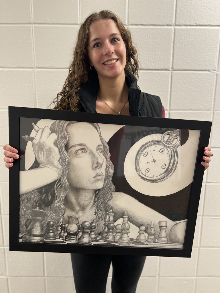 Senior Nicoletta Friedrich with her work “Stippled Time.”