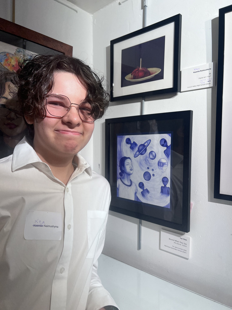 Senior Xen Naimsushyna with “16.”