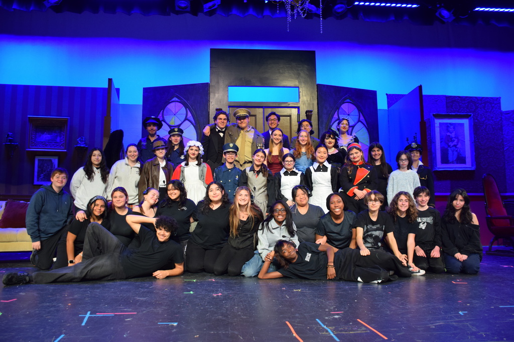 The cast and crew of Clue.