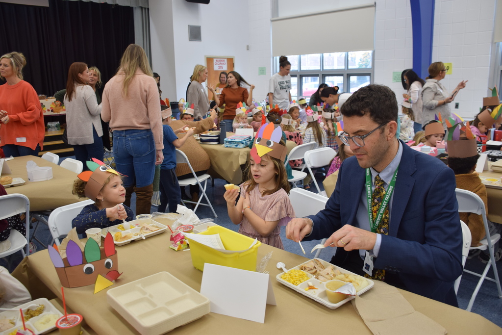 Principal Ross Cohen eats with BP students.