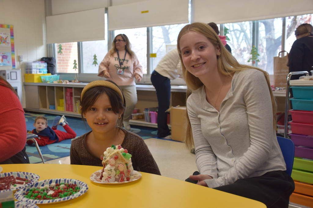 The HS Interact Club visited Bayville Primary to create gingerbread houses with MS. Murnane and Ms. Parshley's classes.