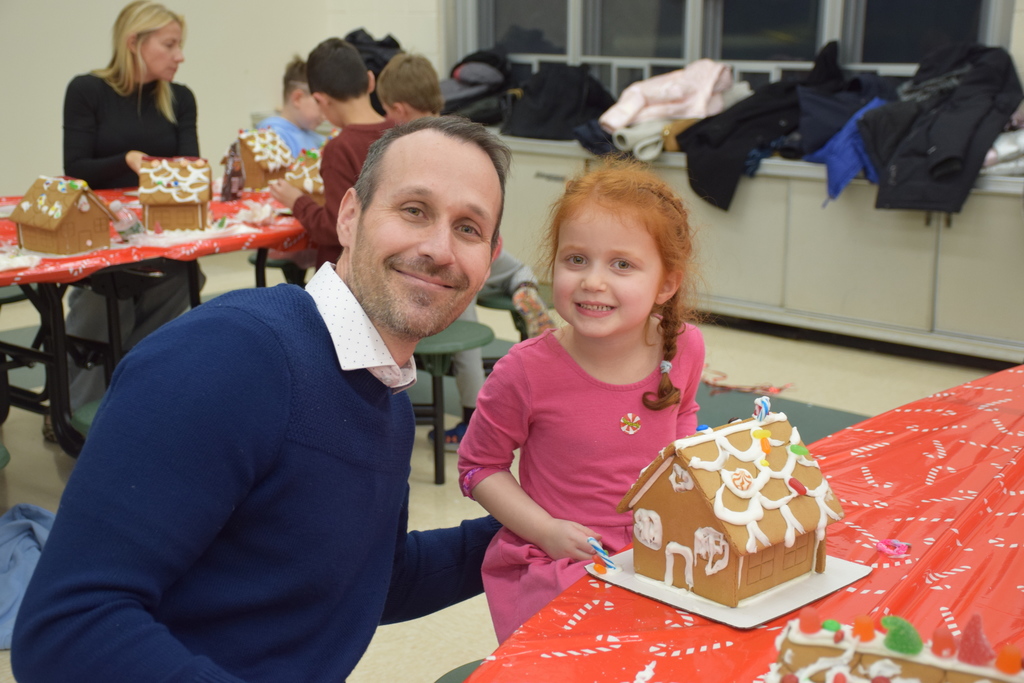 AMP families customized gingerbread houses to bring home for the holidays.