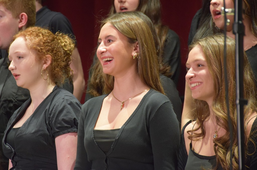 High schoolers Kenzy Goldberger, Izabella Sammut and Marchesa Pleffner (left to right) reveled in performing as part of the chorus.