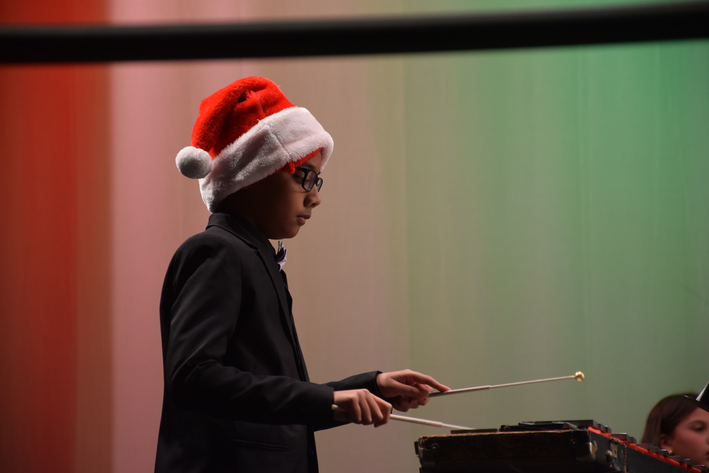 2)	Khadin Hazratalie played the xylophone in the Locust Valley Middle School sixth grade concert. 