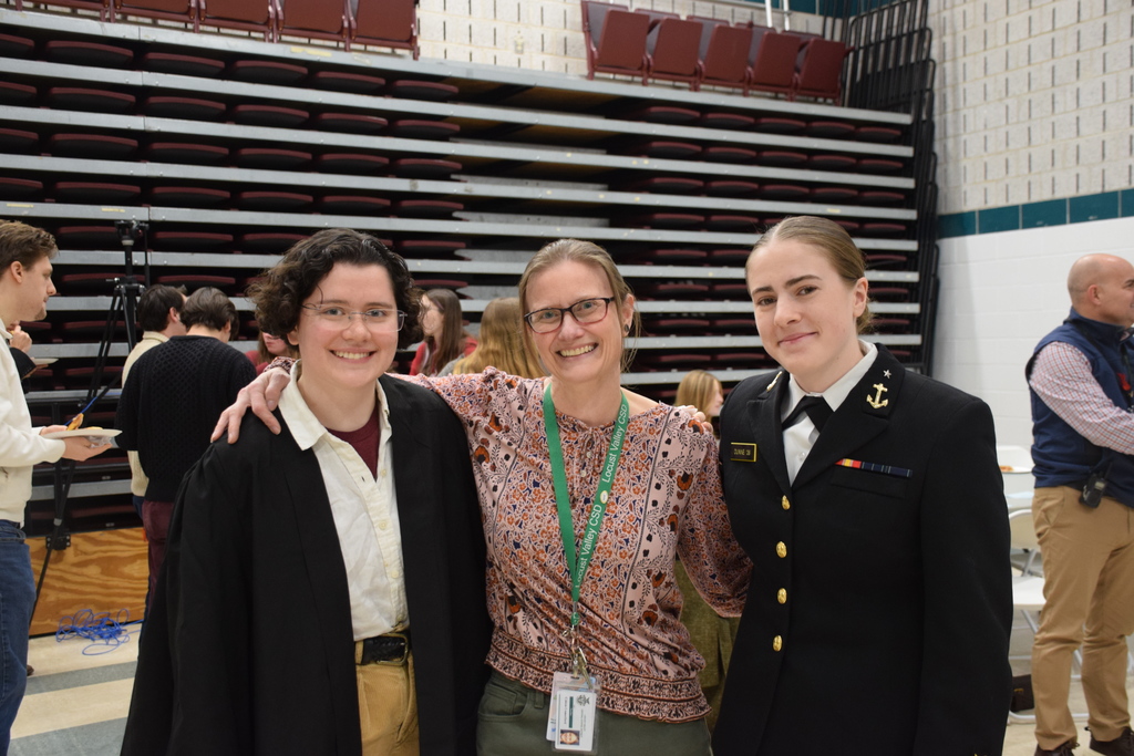 Locust Valley High School alumnae Trinity Benstock and Ellie Dunne with IB teacher Coleen Comerford.