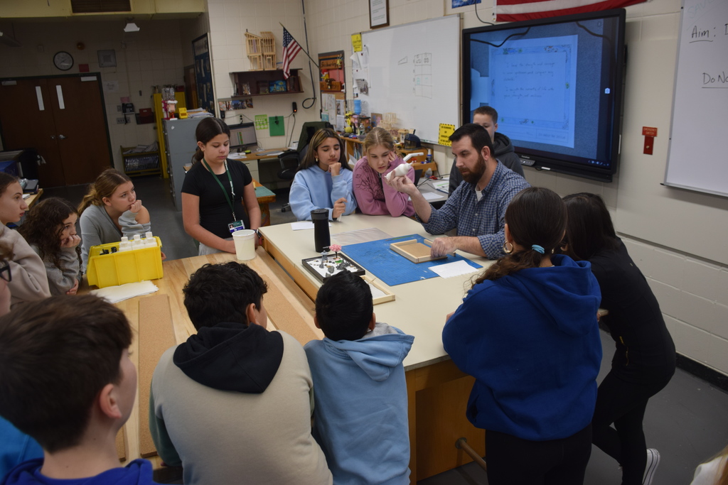 Mr. Labansky explains the project to the class.