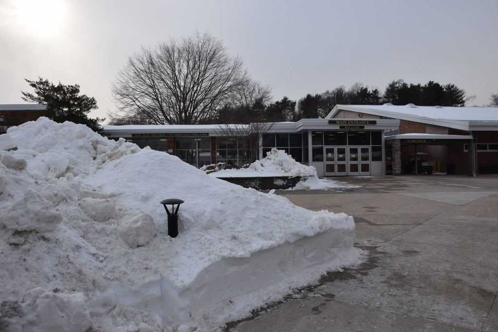 The high school's entrance was cleared by the grounds crew.
