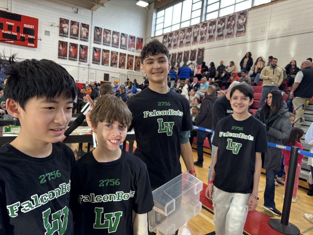 Locust Valley Middle School students Matthew Lu, Jason Eisenberg, Nicholas Cayirli and Aidan Contois (left to right) enjoyed the festivities of the FIRST Lego League qualifier.
