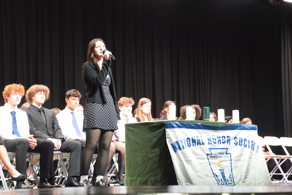 Stella Fraser performs at the NHS induction ceremony.