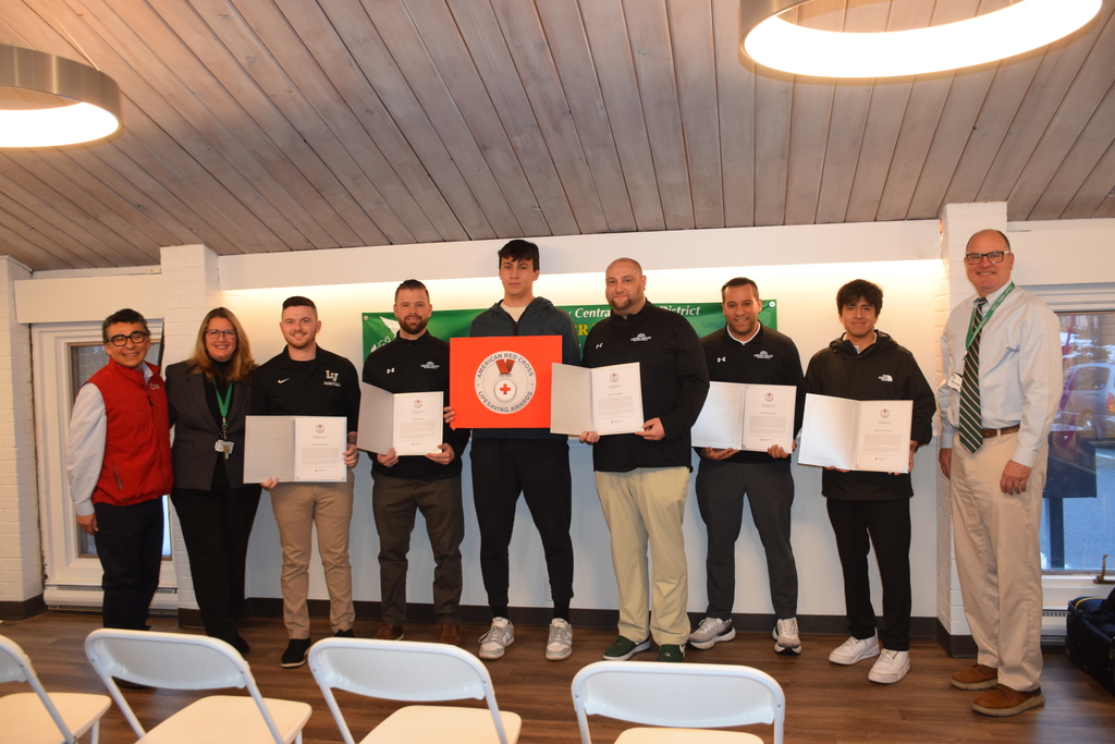 American Red Cross of Long Island CEO, Jose Dominguez (left) presented coaches Brian Lorusso, Andrew Bock, Andrew Siegel, Ben Martinez and Elliot Aramayo with the organizations Lifesaving Awards on March 5 for their efforts to resuscitate high school senior Francesco Allocca (center) during a cardiac event in November.