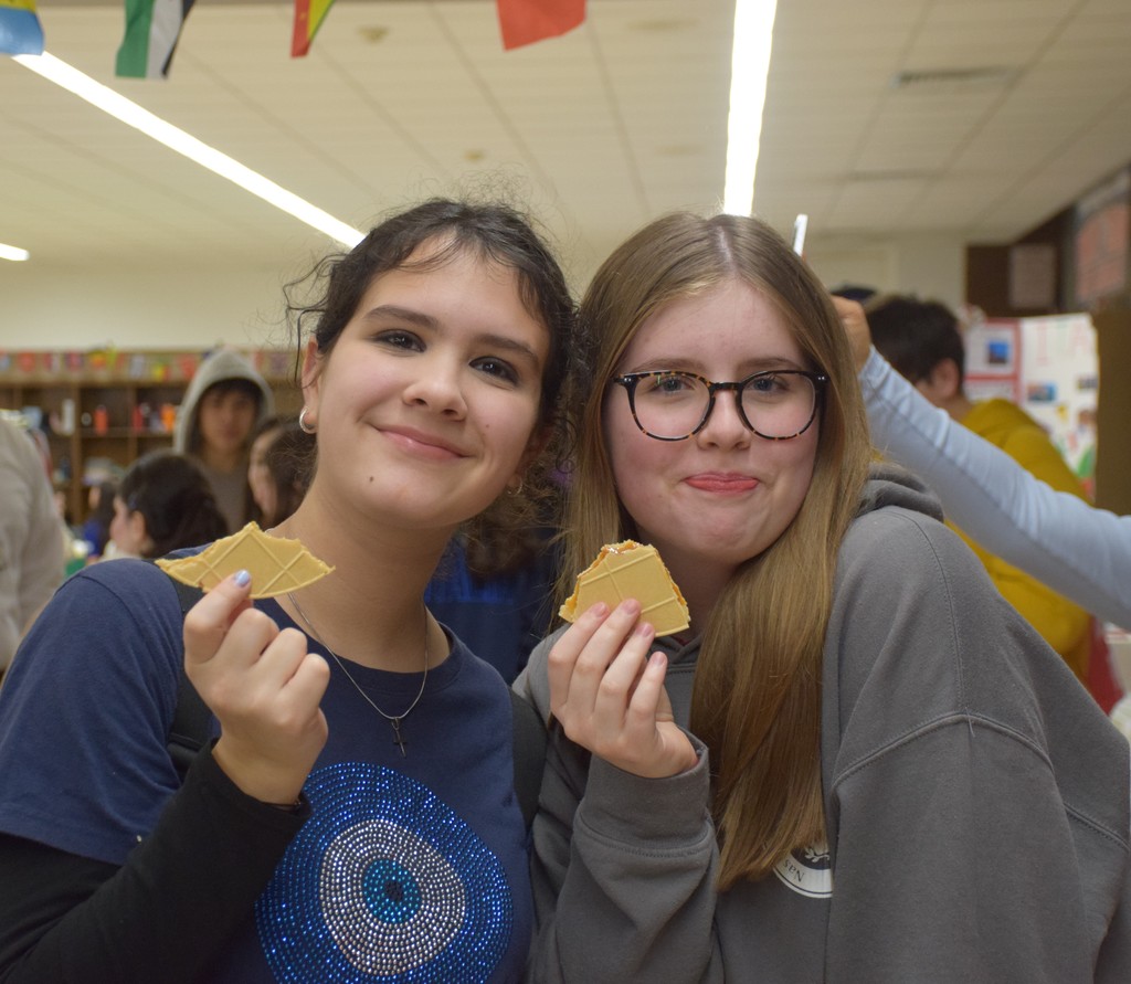 Locust Valley students enjoy Italian cookies at LVMS/HS International Night 2026.