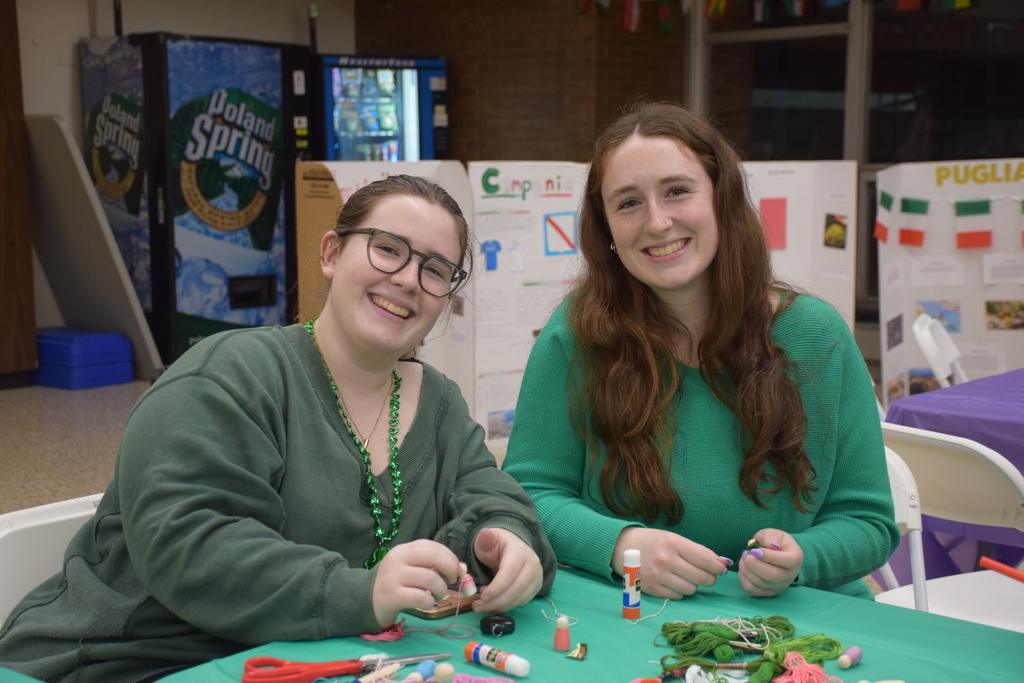 Sisters build crafts together at LVMS/HS International Night 2026.