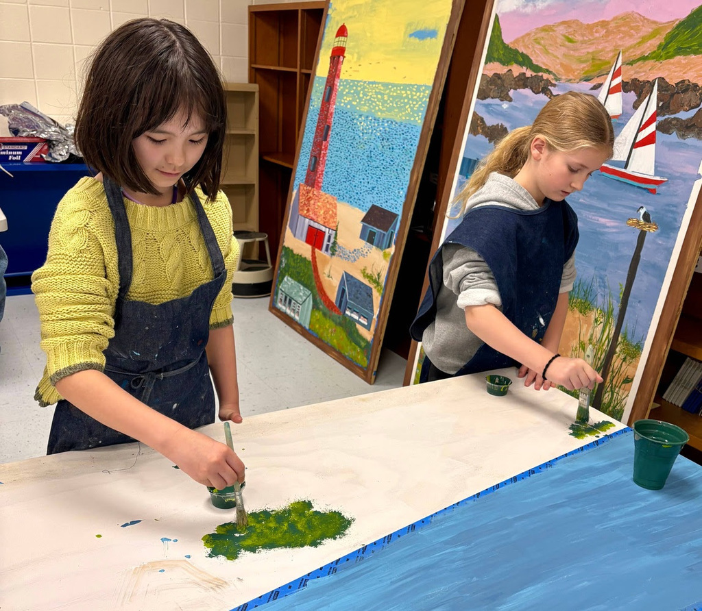 BI students work on the Bayville scenes that will be hung in the school cafeteria.