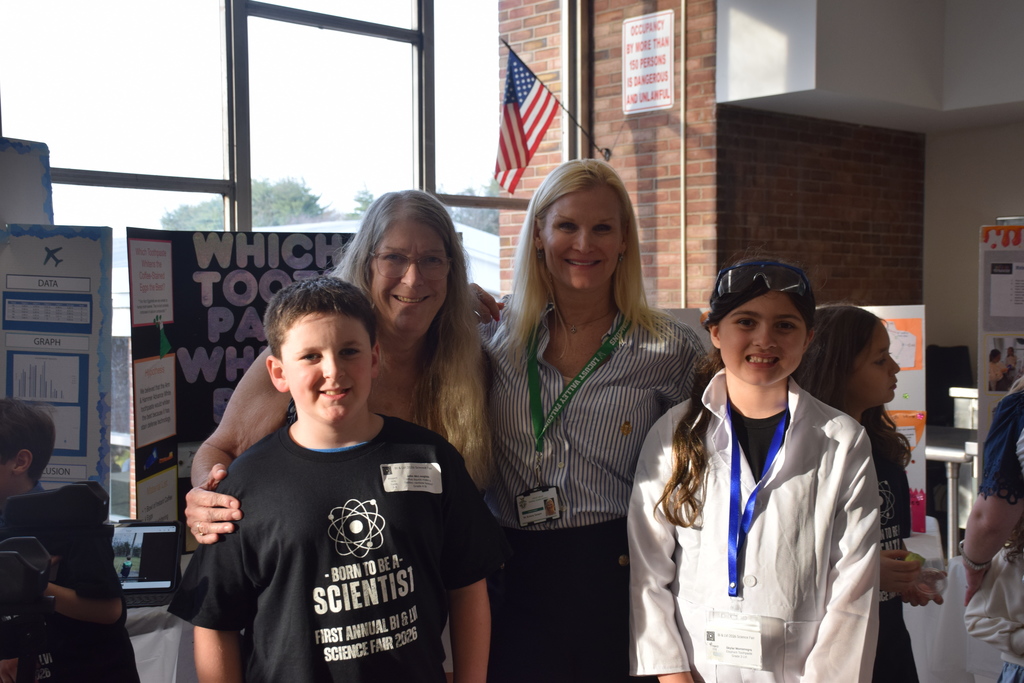 Superintendent Dr. Kristen Turnow with students John McLoughlin and Skylar Montenegro.