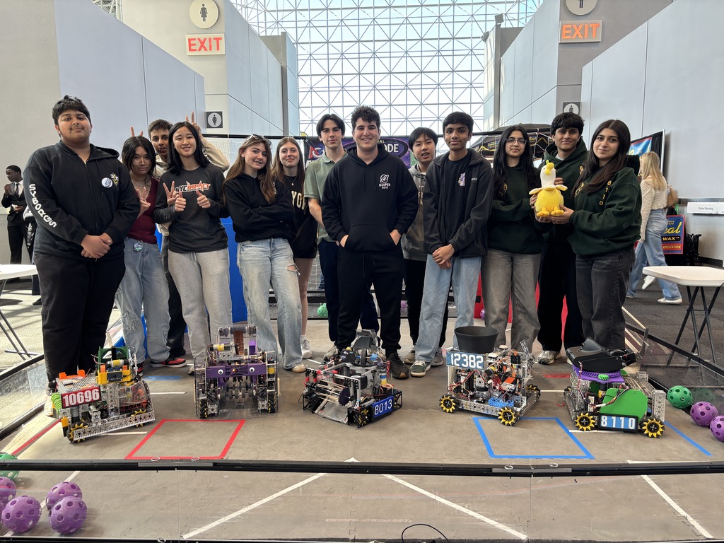 Team Kuiper members worked the robotics table with 22 other high schools during spring break.