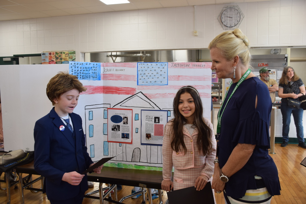 Bayville Primary School students Nina Orlowsky as John F. Kennedy and Elaina Linnemeyer as Jacqueline Kennedy presented their project to Superintendent of Schools Dr. Kristen Turnow.