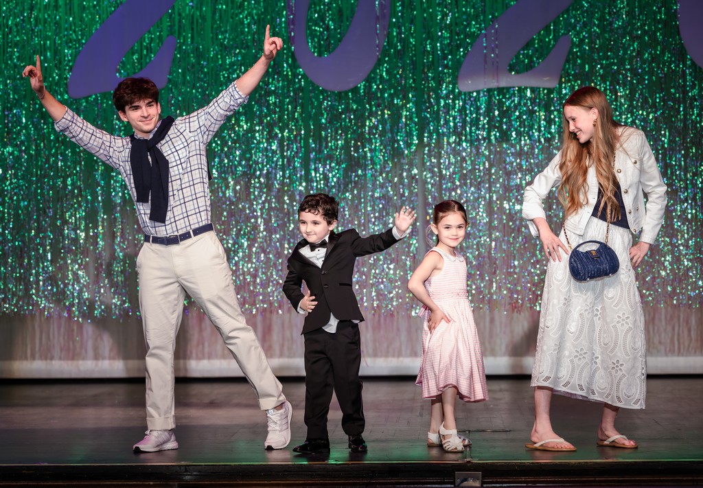 Locust Valley High School seniors and kindergarteners are cheered on by the crowd at the annual fashion show.