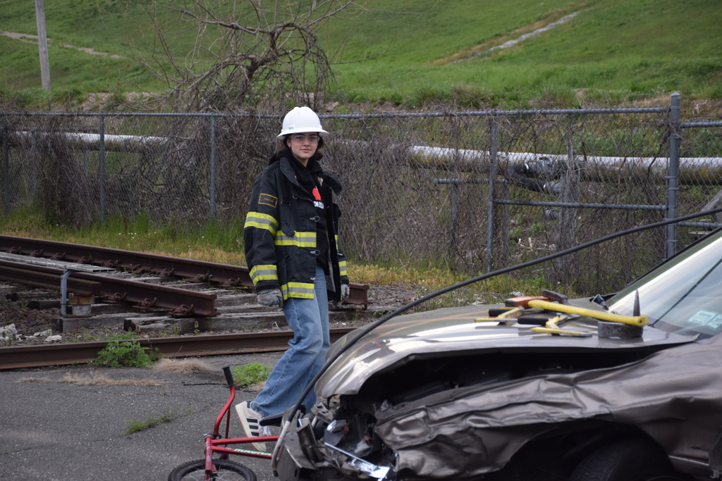 Locust Valley High School student Pantelia Papadopoulos looked for victims in the mock car crash.