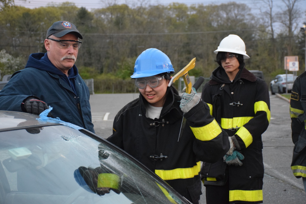 Locust Valley High School student Grace Choi utilized a took to gain entry to the car wreck.