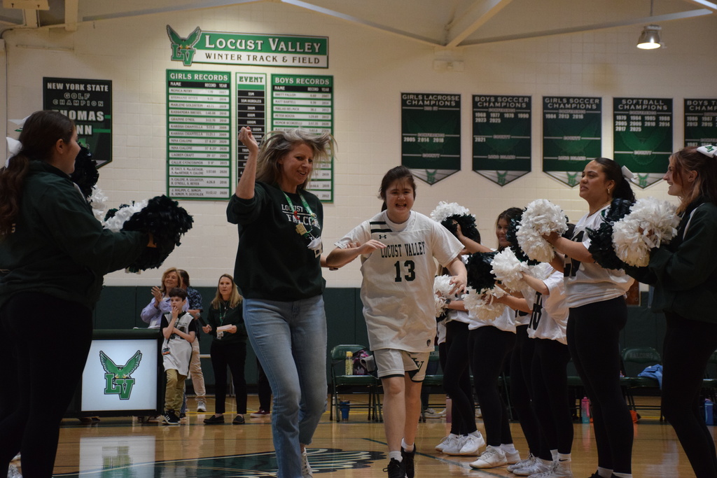 Locust Valley High School student Audrey Alfieri and her teammates received an incredible ovation from the students’ section and cheerleaders during an exhibition game against North Shore High School life skills students.