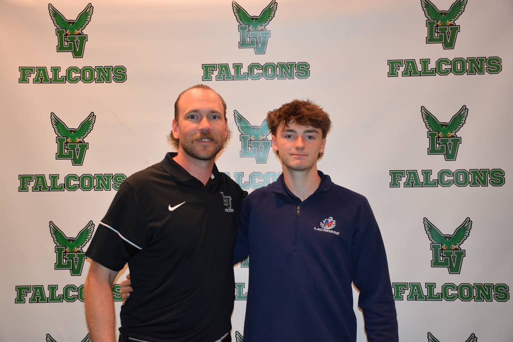 Coach Tom Duggan and Will Summers on college signing day 2026.