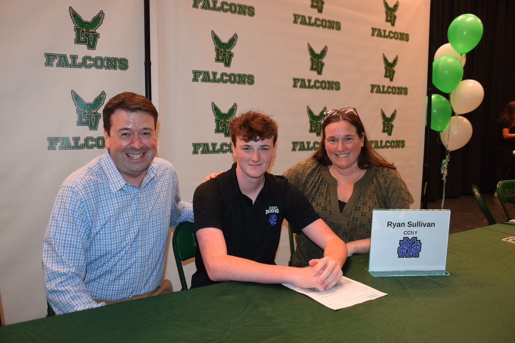 Ryan Sullivan and his parents on college signing day 2026.