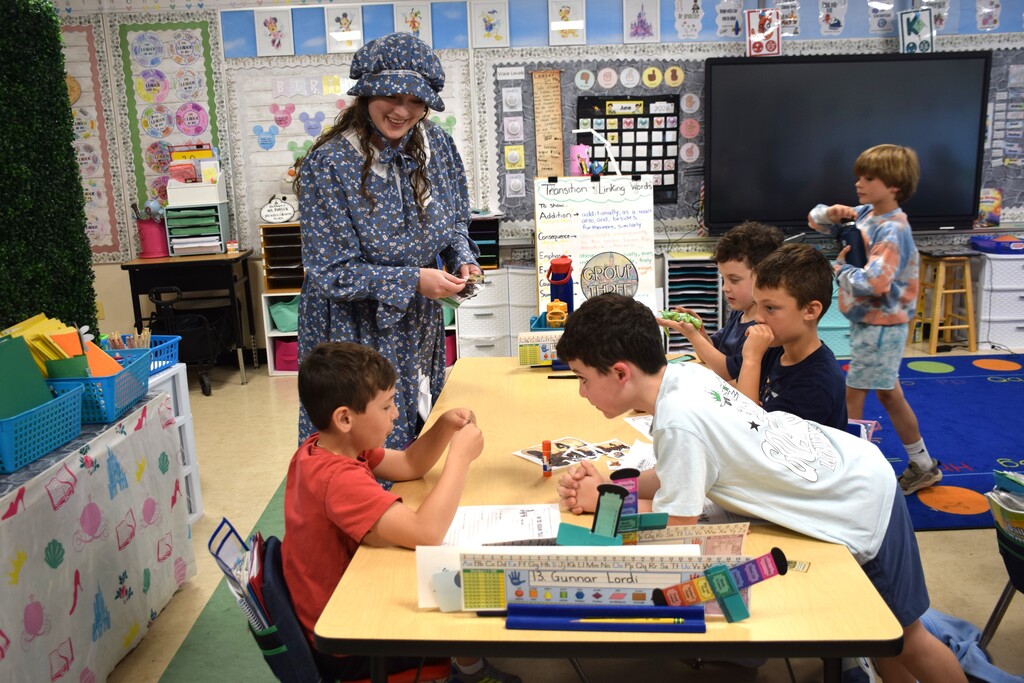 Students in Ms. Pawluk's class at AMP problem-solved their way through a pen and paper version of The Oregon Trail.