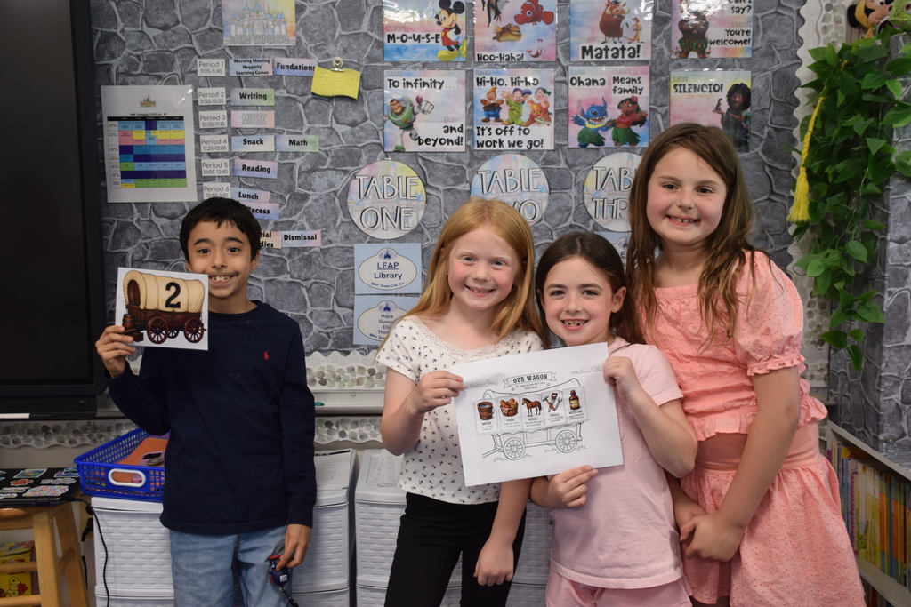 AMP students showed off their supply wagons on as part of The Oregon Trail.