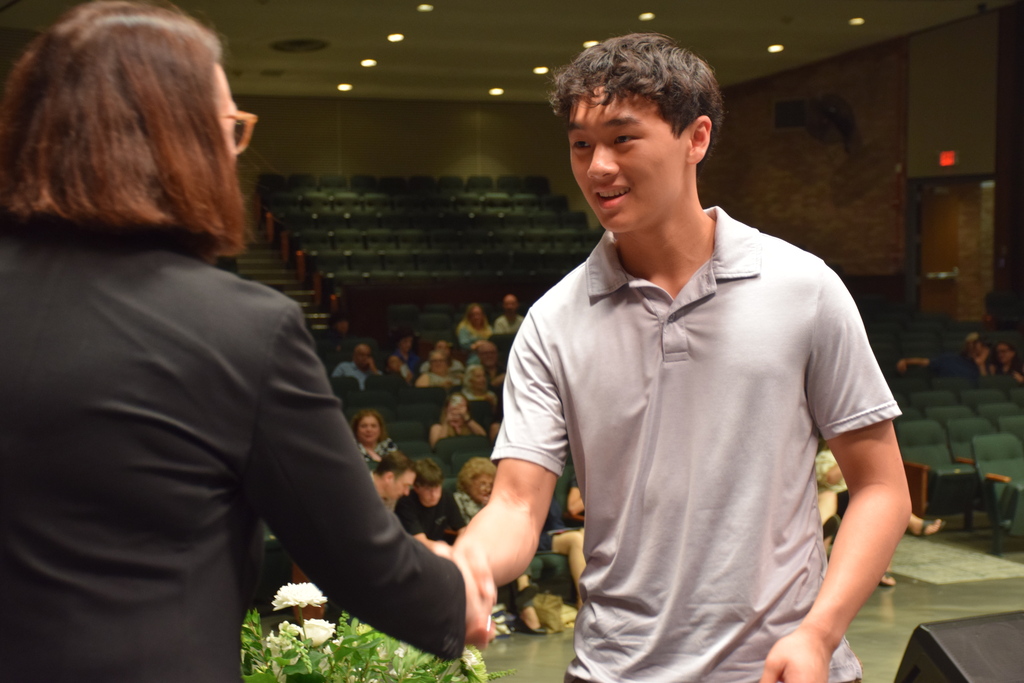 LVHS Class of 2026 Valedictorian Justin Kwok accepts an award at the Senior Academic and Community Awards.