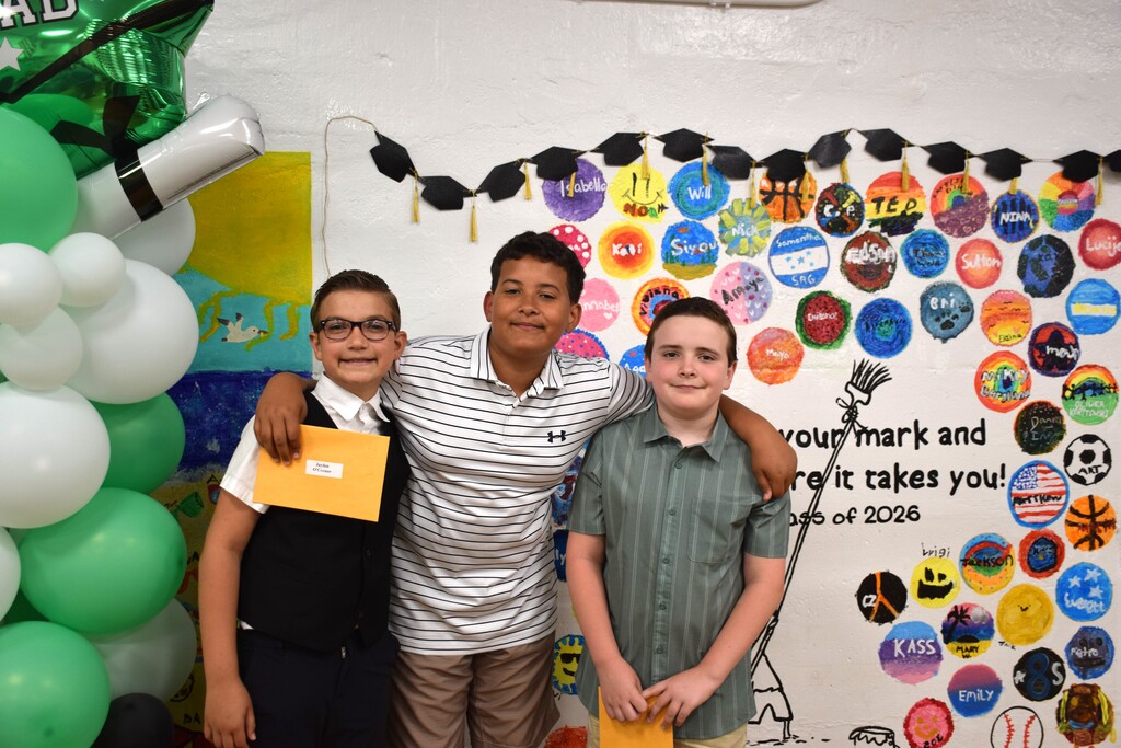 BI students celebrate the end of fifth grade as their moving up ceremony.