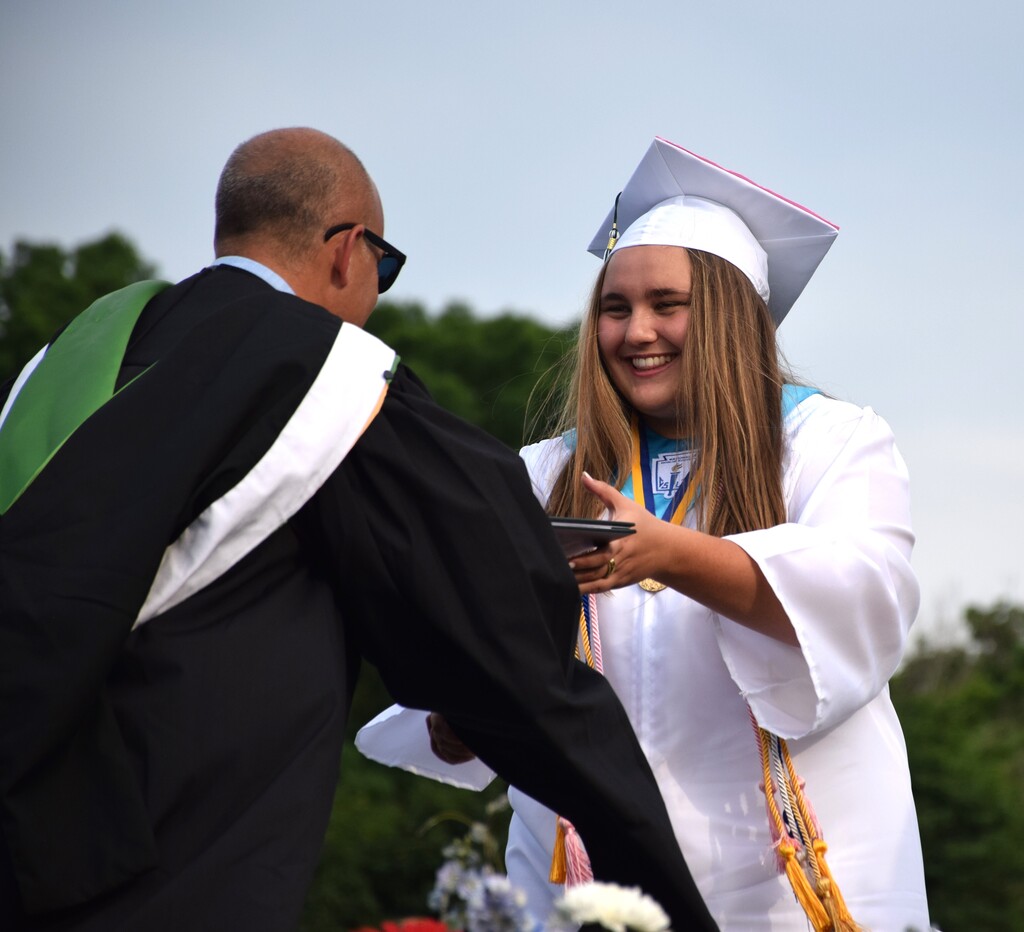 Senior Gianna Craft received her diploma from principal Patrick DiClemente.