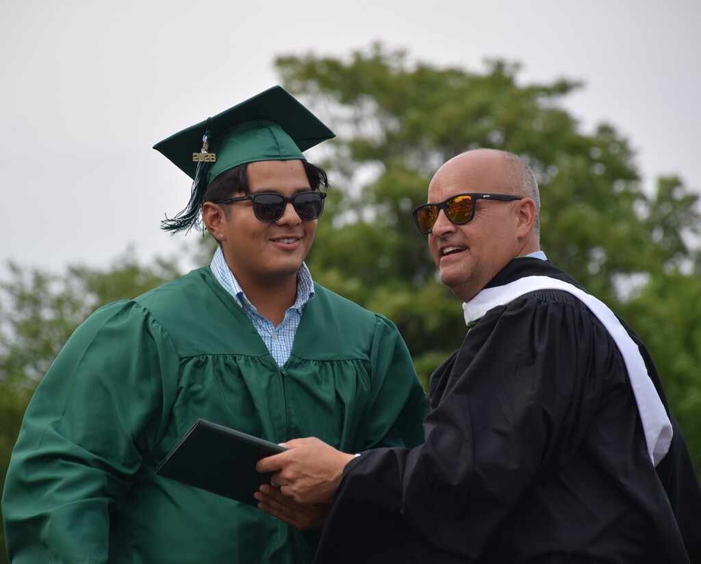 Senior Anthony Castro accepted his diploma from principal Patrick DiClemente.