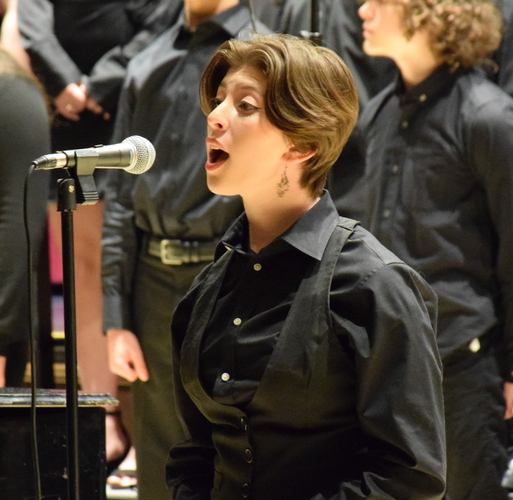 Sara Nearenberg performs with the Locust Valley High School chamber singers during a collaborative concert with Hofstra University singers in March 2023.