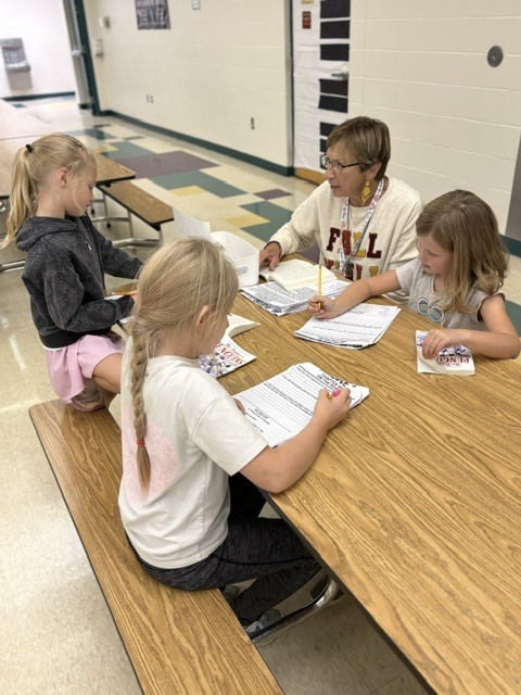 W.I.N. Students learning and engaging with Mrs. Nordby. W.I.N. Time stands for "What I Need" Time, a dedicated daily block (usually 30 to 60 minutes) used to provide personalized academic support, targeted intervention, or enrichment for every student