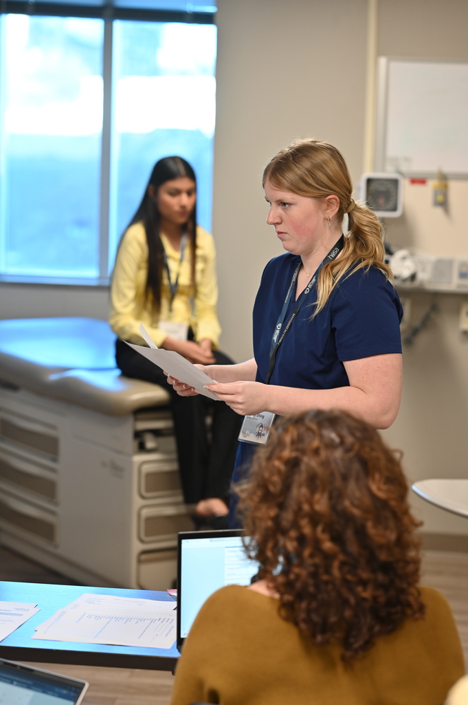 Aubrey Uhing prepares to demonstrate her blood glucose testing skills using a glucometer during the Patient Care Technician event.