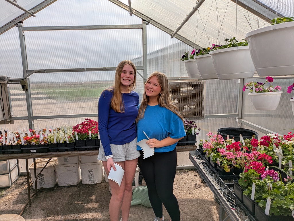 Kate and Marissa tagging plants.