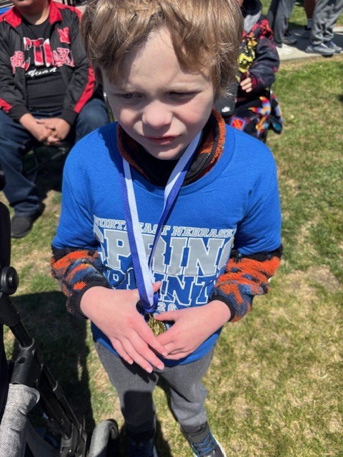 student with medal