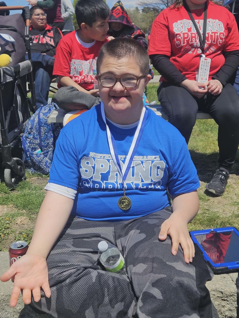 student with medal 