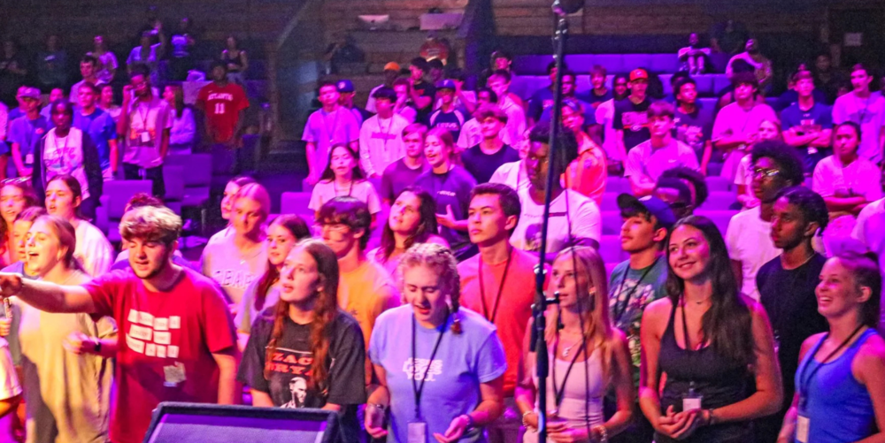 Students worship at Alpha Camp in 2024.