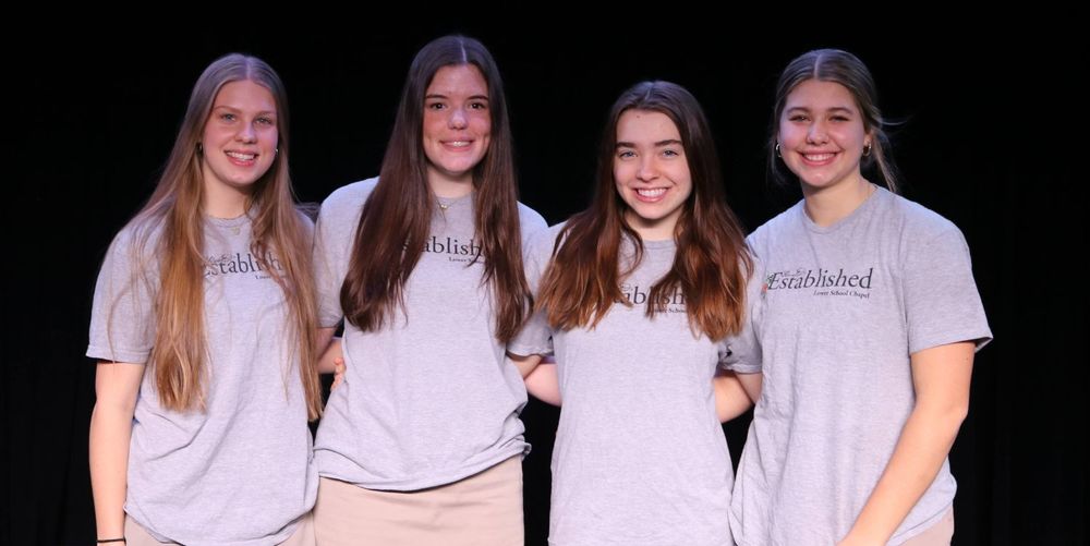 4 girls smiling
