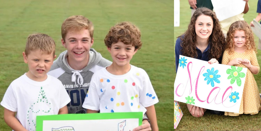 Kindergarten students pose with their senior high school mentors for a photo.