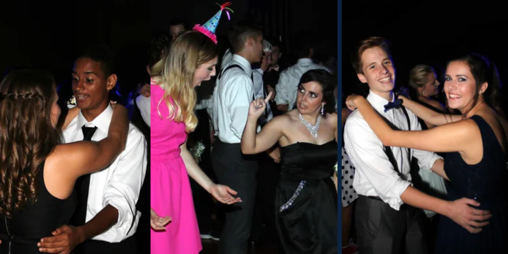 Three couples of people are dressed in black dresses and black and white suits while dancing in a dark room.