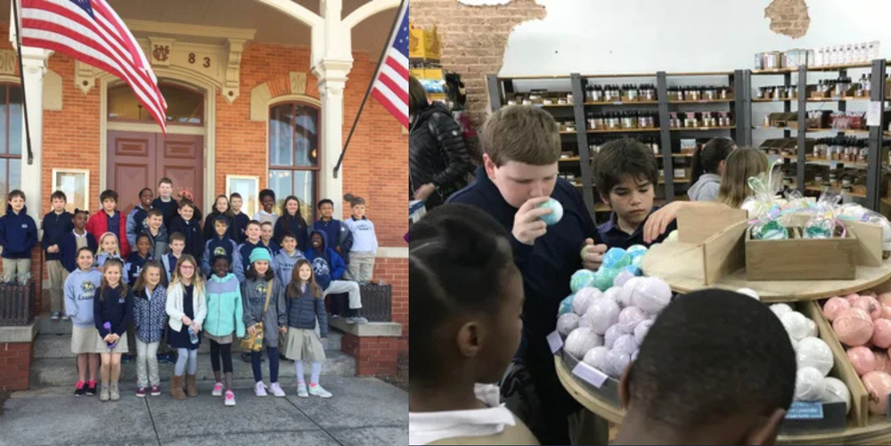 A group of students pose for a photo while on a 3rd grade field trip.