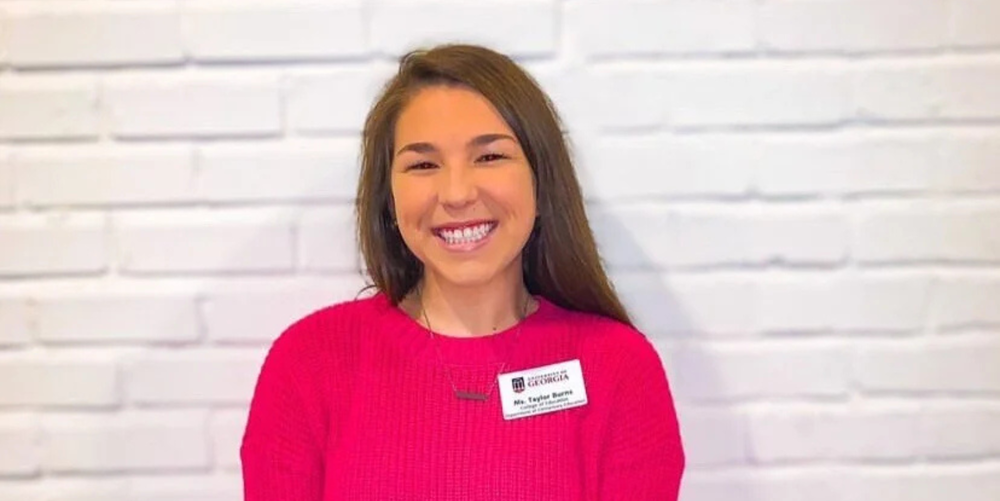 A smiling lady poses for a photo, she is featured in Loganville Christian Academy's alumni spotlight series.