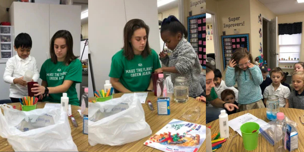 A group of students work on projects with a black haired female wearing a green shirt. 
