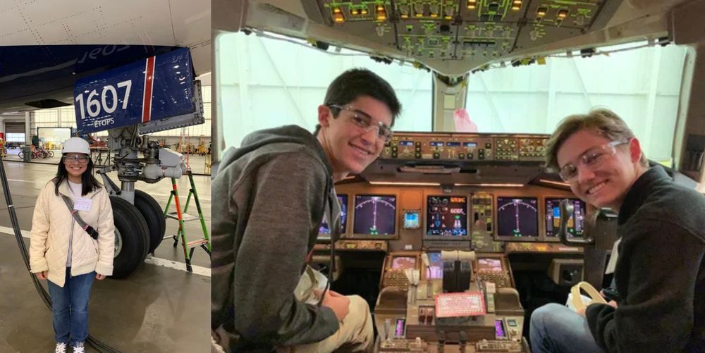 Three students pose for a photo while smiling and wearing safety glasses on their tour of Delta TechOps